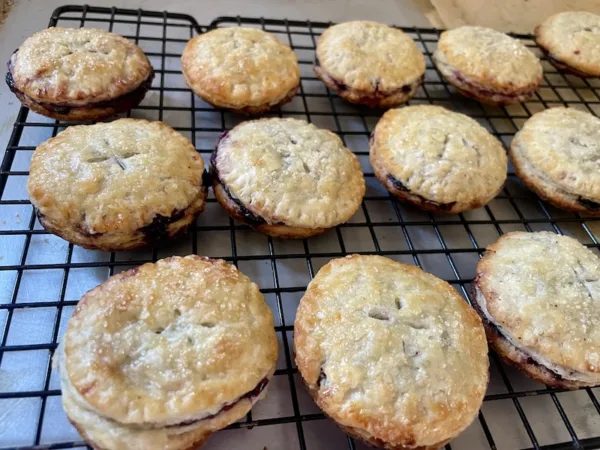 Baked pies cooling on a wire rack