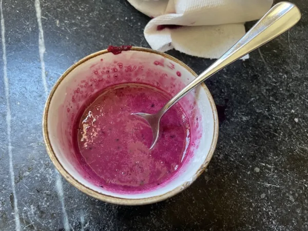 Make a slurry of corn starch, cardamom, and partially cooked filling juices