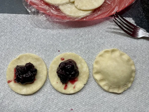 Place a scant tablespoon on each circle, then cover