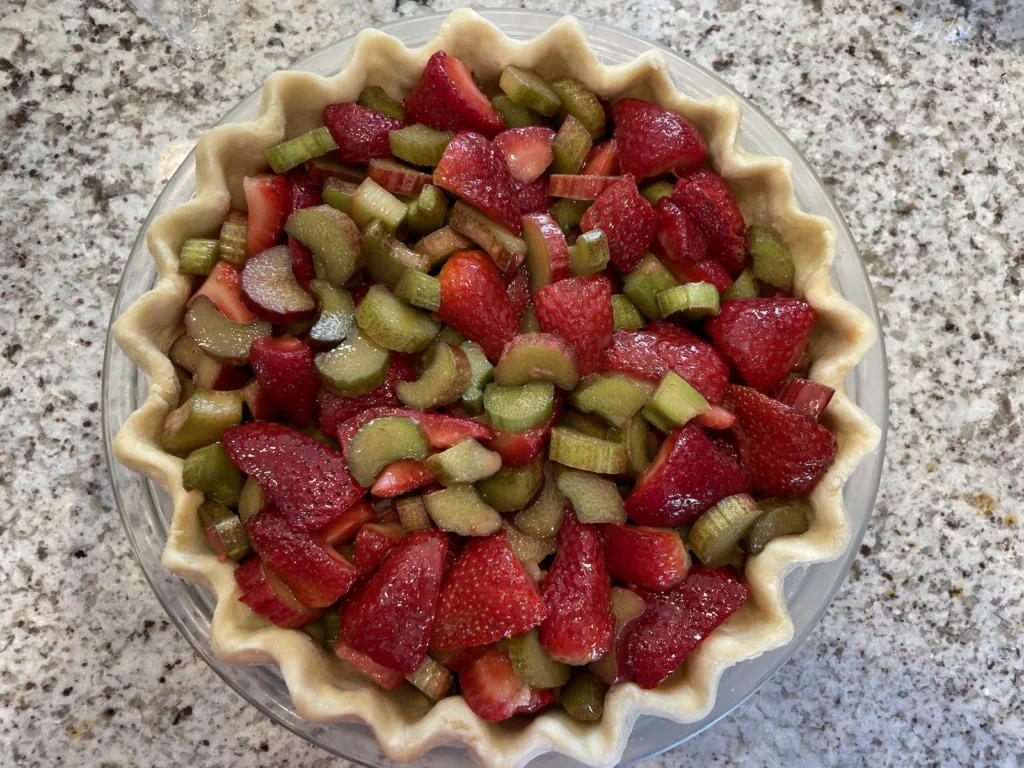Strawberry rhubarb pie ready for baking